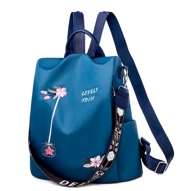 blue embroidered backpack for women on sale