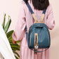 woman with a blue pu leather backpack bag